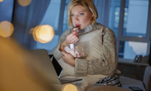 Pathetic girl observing sad film